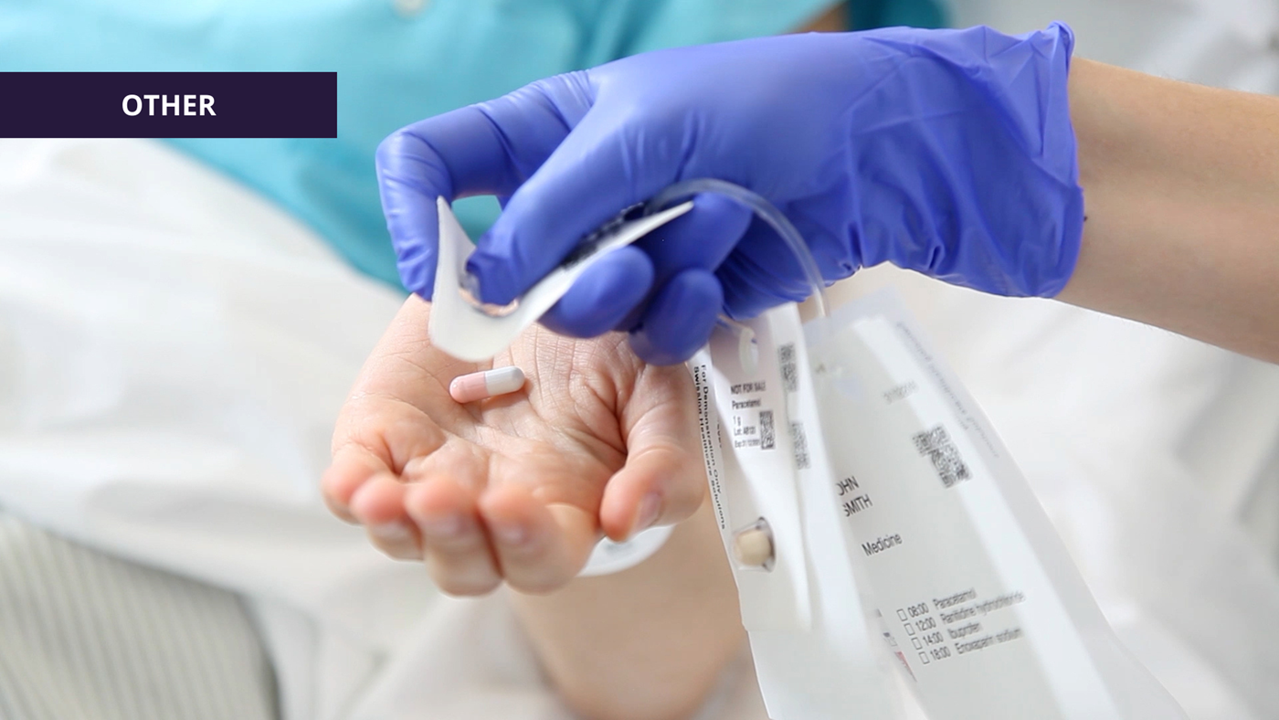 hospital staff administering medication