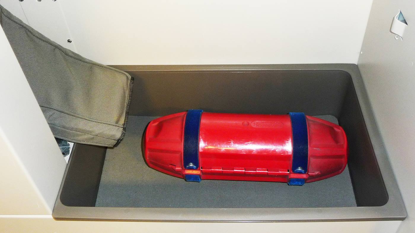 Pneumatic tube system carrier in the receiving bin of the TransLogic Whisper Receiving System
