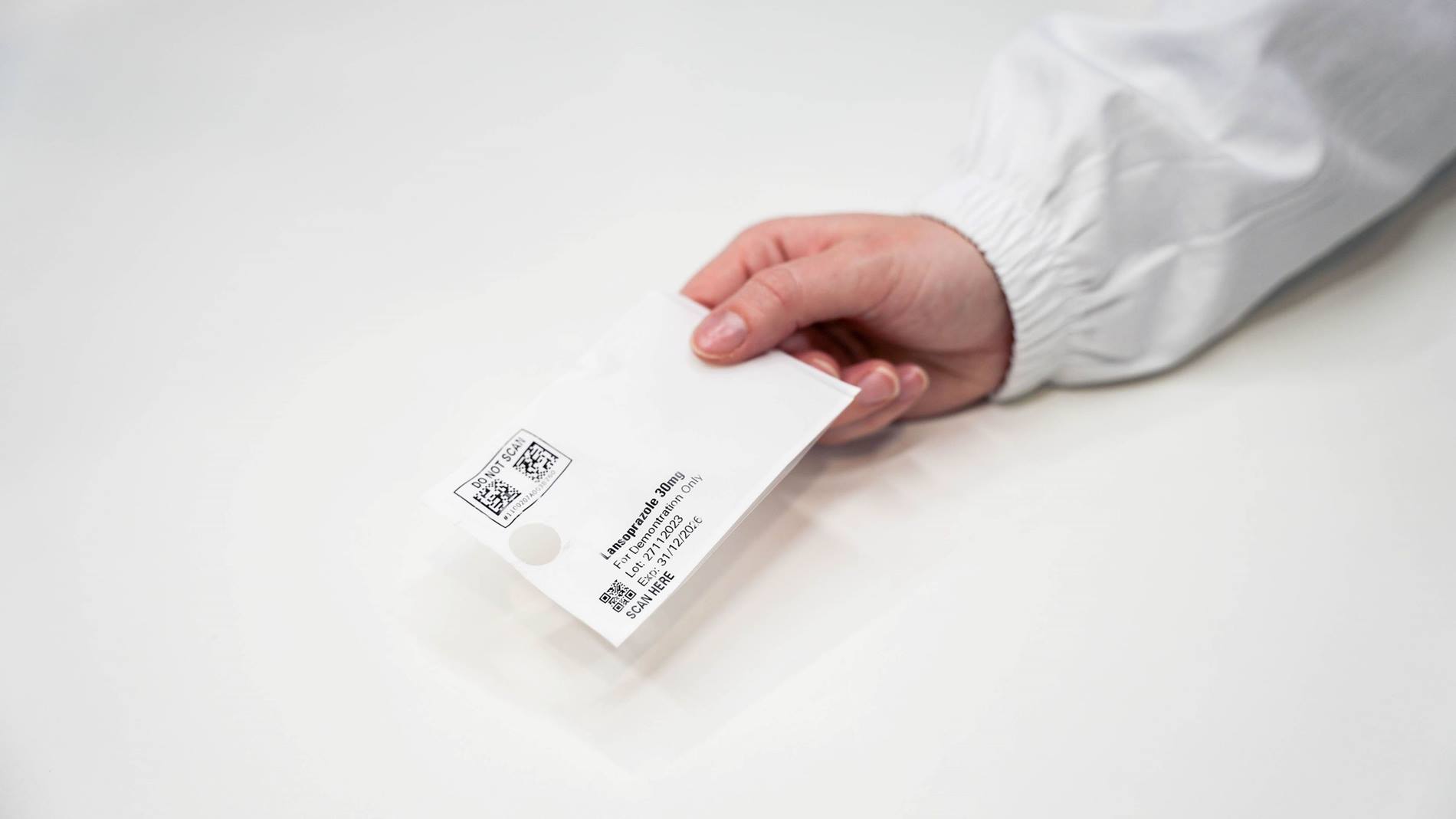 Main présentant une dose unitaire