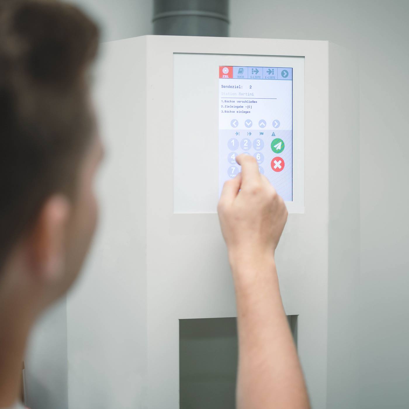 Caregiver Tapping on Touchscreen